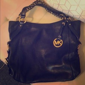 Michael Kors leather handbag with crossbody strap